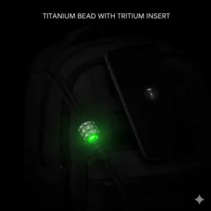 Innovative titanium lanyard beads featuring glowing tritium inserts for visibility in the dark.