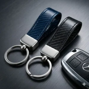 Sleek carbon fiber automotive key rings designed for modern sports car enthusiasts.