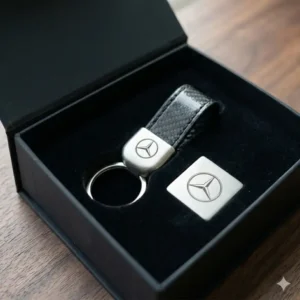 Luxury automotive key rings presented in a matte black gift box for car lovers.