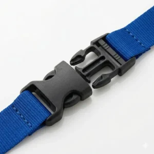Close-up of a black plastic safety clasp on a breakaway neck lanyard designed for quick release.